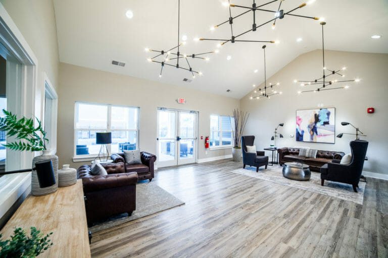 open gathering area with comfy leather furniture
