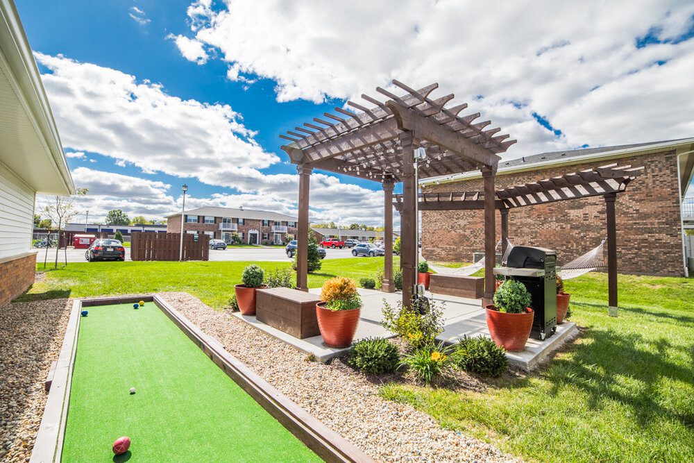 Bocce ball court and pergola are just two of the amazing amenities available at Trailside Flats in West Lafayette
