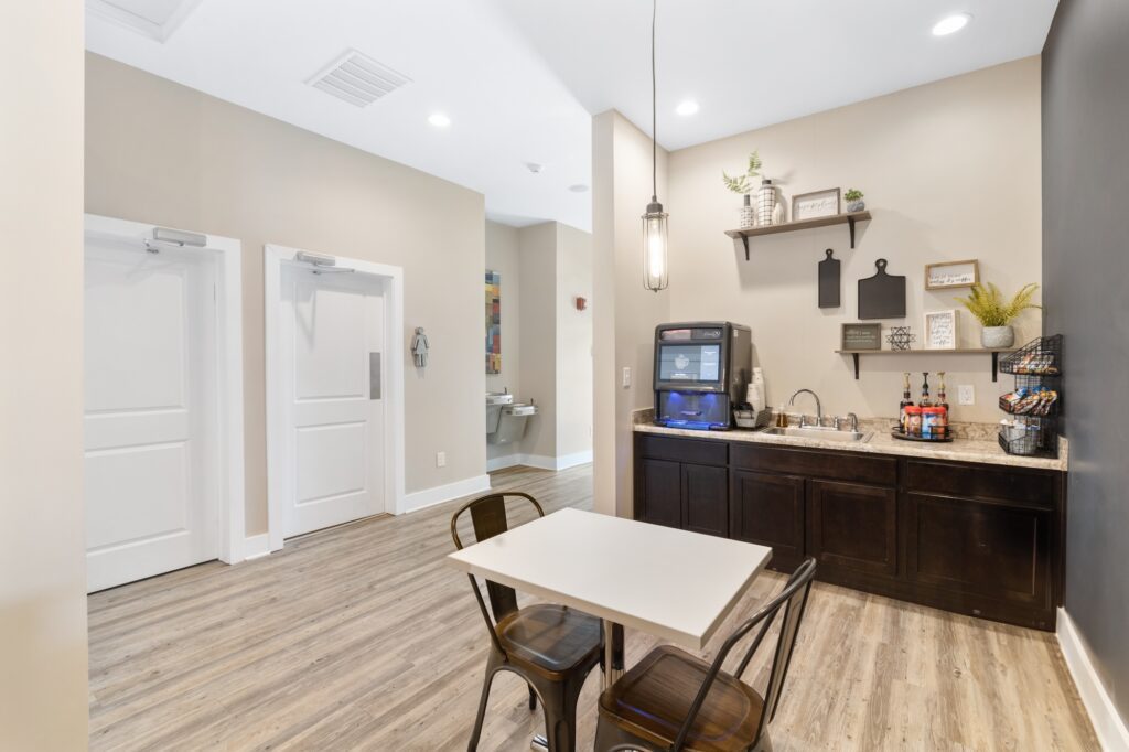 Coffee Bar with a set of table and chairs