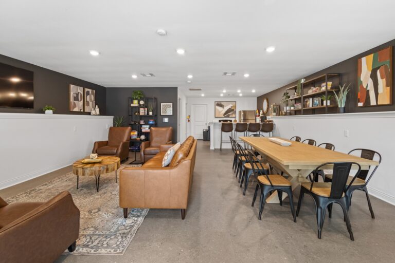 comfortable lounge area with tables and couches