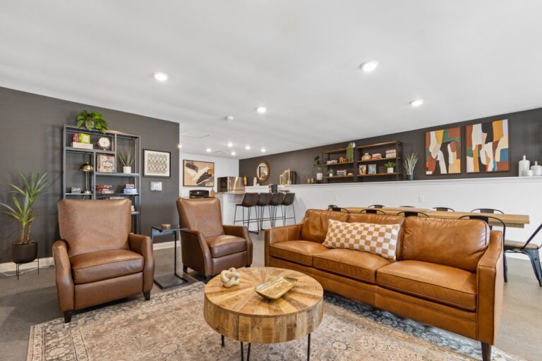 comfortable lounge area with tables and couches